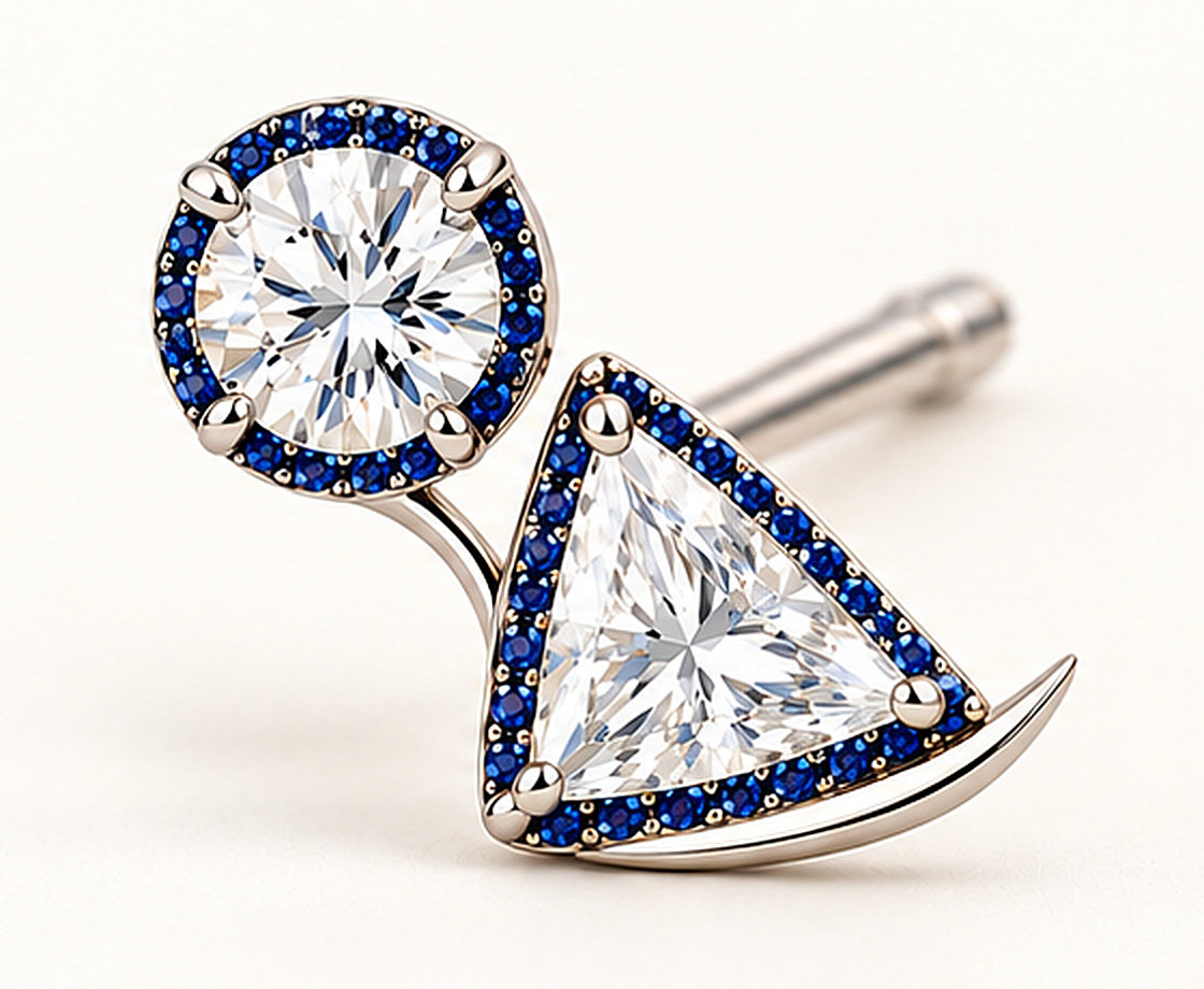 The ittwoy earring in white gold: a round diamond and a triangle diamond, each ringed in sapphires